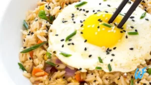 Read more about the article EGG AND CHICKEN FRIED RICE WITH VEGETABLES RECIPE