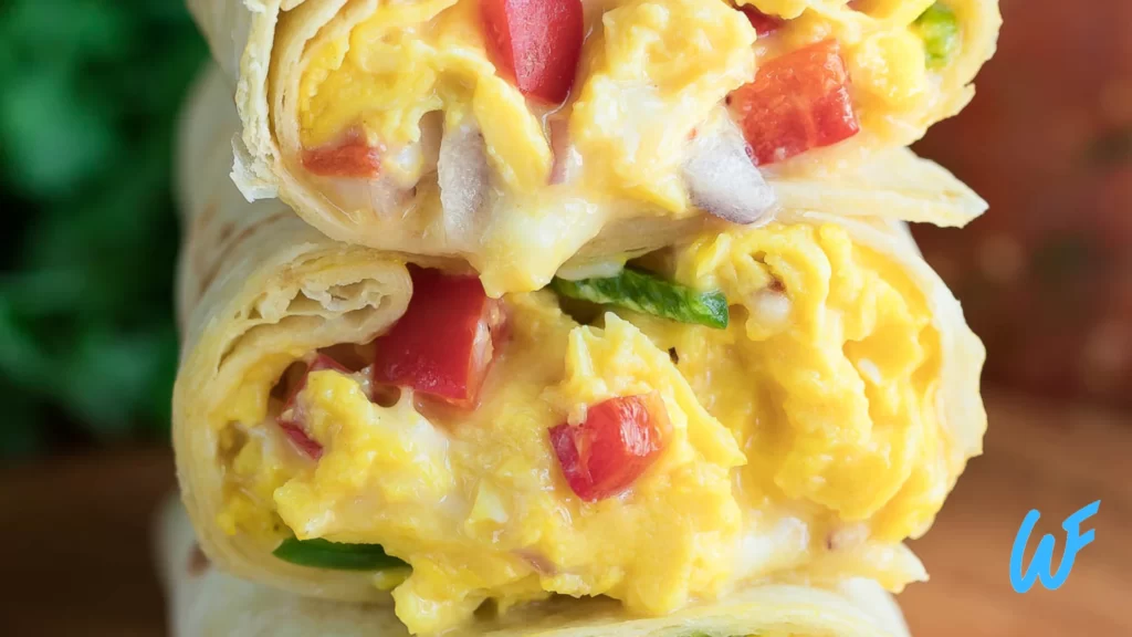 Ham and vegetable breakfast burrito